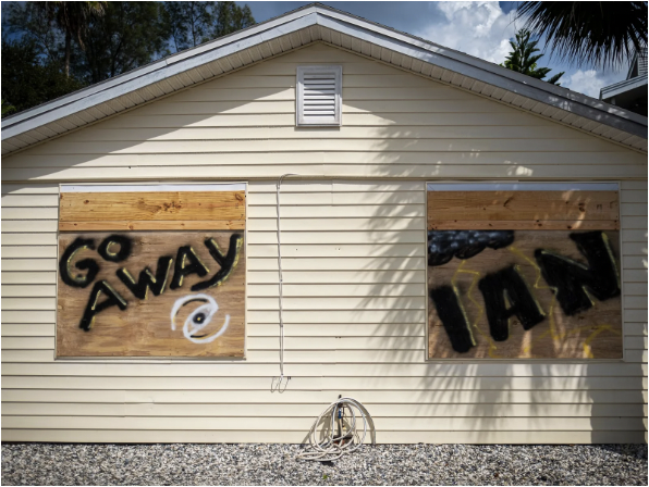 boarded up house